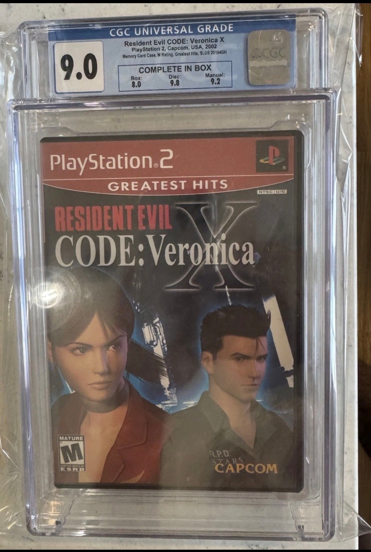 Resident Evil Code: Veronica X CGC 9.0 (Capcom, 2002) Box 8.0, Disc 9.8, Man 9.2