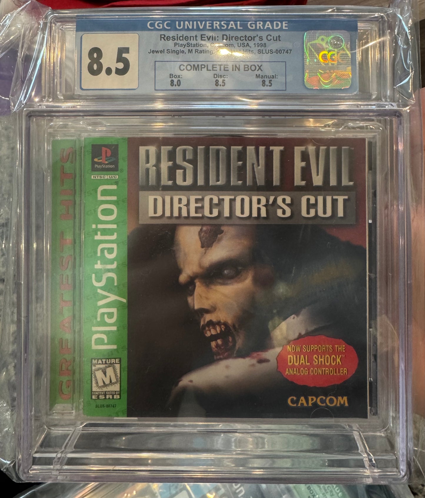 Resident Evil: Director's Cut PlayStation Greatest Hits CGC 8.5 (Box 8, Disc 8.5, Manual 8.5)