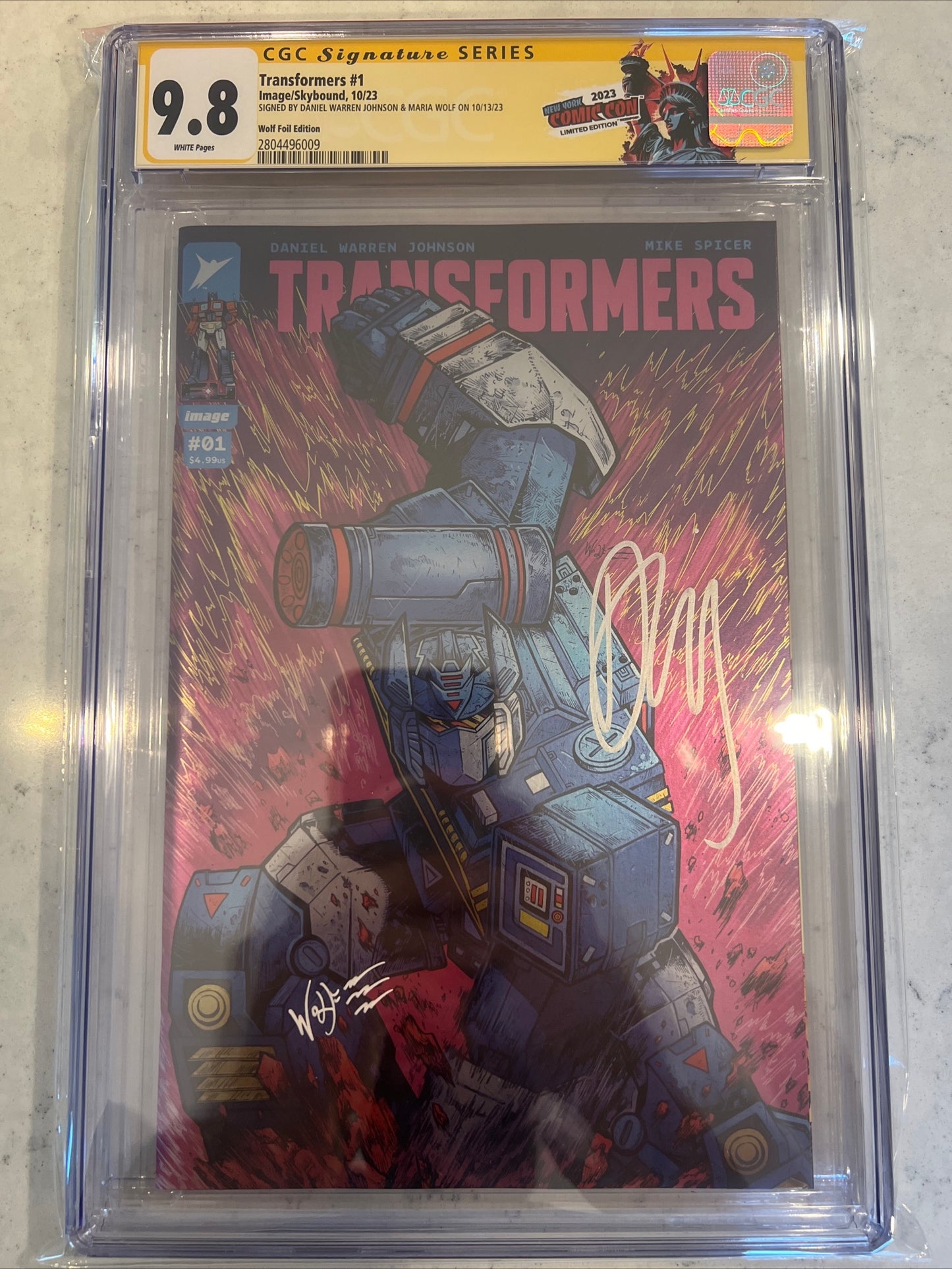 Transformers #1 (Image/Skybound) CGC SS 9.8 (Maria Wolf Foil Cover) signed by Daniel Warren Johnson and Maria Wolf